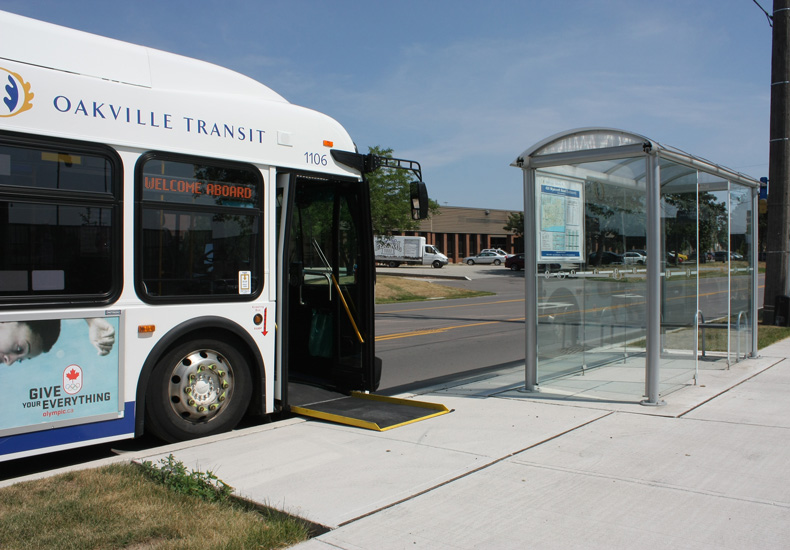 An Oakville Transit bus with the ramp down.
